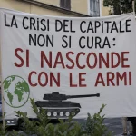 «La crisi del capitale non si cura: si nasconde con le armi»
